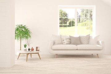 Stylish room in white color with sofa and summer landscape in window. Scandinavian interior design. 3D illustration