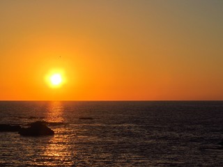 Naklejka na ściany i meble sunset at the sea in Maitencillo beach, central coast of Chile