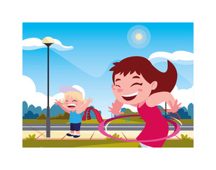 Fototapeta premium children smiling and playing with hula hoop