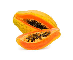a whole and slices of ripe papaya fruit isolated on white background.