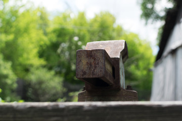 Rusty parts of woodworking machine on blurred background