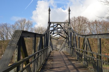 wooden bridge over the river