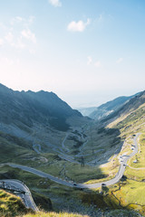 Beautiful mountain country with serpentine road and green plant