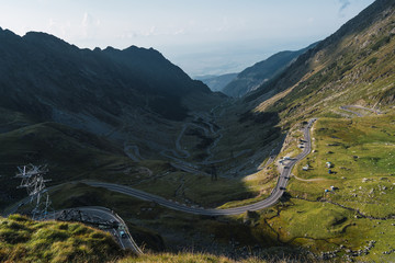 Landscape of peaceful highland country with serpentine road