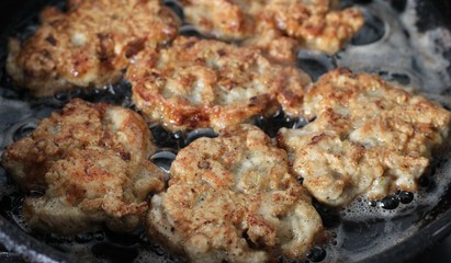 chopped cutlets fried in a pan
