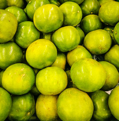 Tangerine in the market. Pile of tangerines. Thailand Oranges