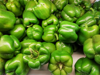 Obraz na płótnie Canvas Sweet Green peppers background. Paprika peppers