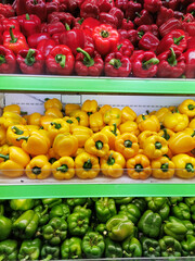 Sweet yellow peppers background. Paprika peppers