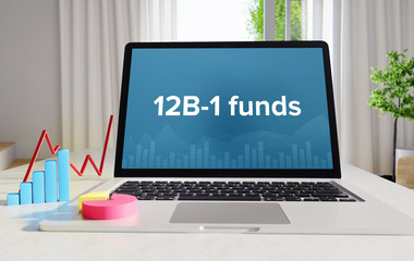 12B-1 funds – Statistics/Business. Laptop in the office with term on the Screen. Finance/Economy.