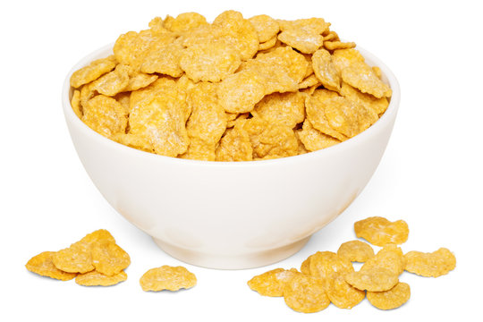 Crunchy corn flakes breakfast cereals in white bowl