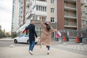 Obraz premium Joyful young people expressing their positive emotions