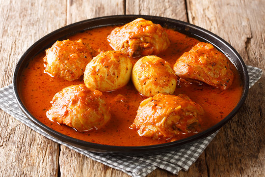 Ethiopian national dish, doro wat is the most popular traditional food in that country close-up in a plate. Horizontal