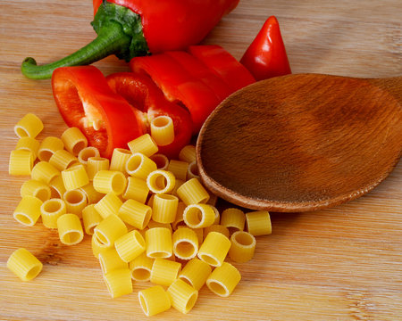 Pasta And Red Pepper On Wooden Table