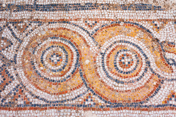 Turkey, Aegean region, Izmir province. Ruins of ancient Greek city Ephesus (Efes). Antique mosaic on floor, destroyed buildings.  Detail of geometric mosaic. Famous open-air museum.