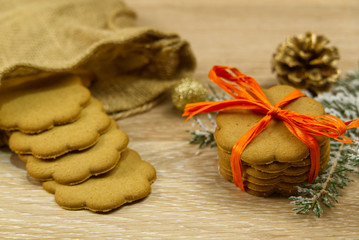 Christmas cookie or Gingerbread cookies on a wooden background.