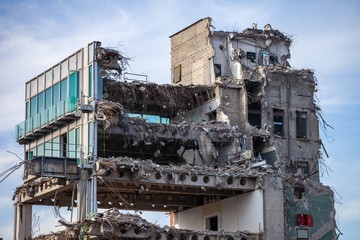 modern building being demolitied