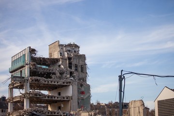 modern building being demolitied
