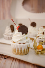 Cupcakes with cookies whipped cream