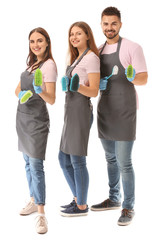 Fototapeta premium Team of janitors on white background