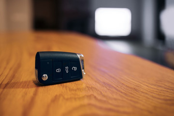 Car ignition key at the table