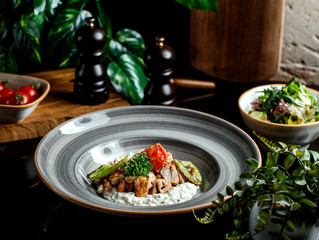 fried meat pieces and vegetables