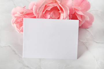 Business card feminine mockup. Branding card with flowers on background. Styled stock photography. Place for text