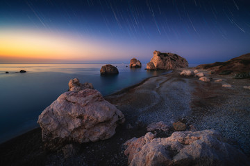 Sunrise at Petra tou Romiou - Aphrodite's rock a famous tourist travel destination landmark in Paphos, Cyprus