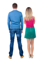 Back view of couple. beautiful friendly girl and guy together.