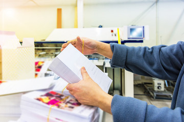Manipulating envelopes for mailing - obrazy, fototapety, plakaty