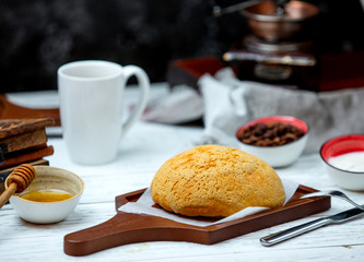 white bread on the desk with side mead