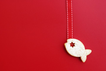 Homemade linzer cookies filled with red jam and dusted with powdered sugar 