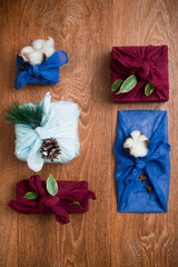 Christmas furoshiki wrapping. Etnical hristmas gift. Zero waste concept