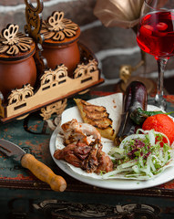 kebab with fried vegetables and onion