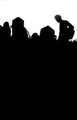 An urban scene highlighted by the contrast between full white and full black of silhouettes. black and white artistic photography with perspective and unusual angle