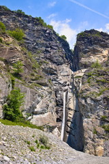 Fototapeta premium Mountain waterfalls in Novalesa, Val Cenischia, Piedmont, Italy, near Turin