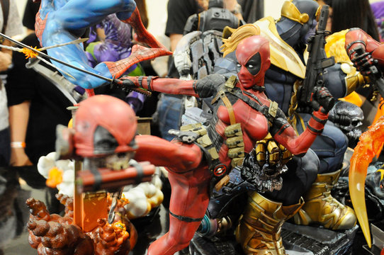 KUALA LUMPUR, MALAYSIA -MARCH 24, 2017: Fiction character of Deadpool from Marvel movies and comic. Deadpool action figure toys displayed by collector for the public.