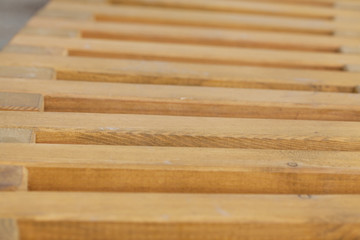 Wooden bench on a large scale