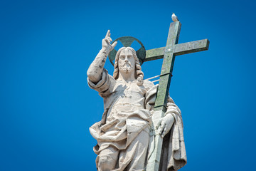 Vatican City - June05 , 2019:  Statue of Jesus on the top of Saint Peter Basilica facade - Seagull