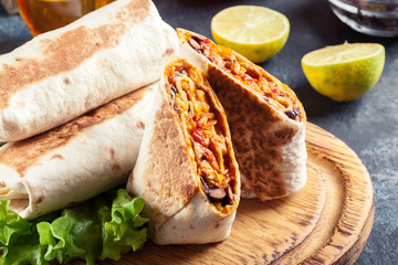 Burritos wraps with mincemeat, beans and vegetables - 306119155