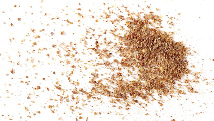 Ground, milled flaxseed, linseed flakes isolated on white background
