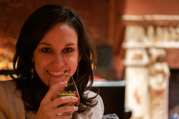 girl drinking cocktail at Venice, Italy