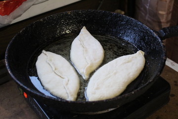 cooking fried pies in the pan 
