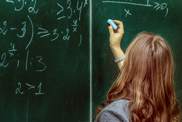 close up of math formulas on a blackboard