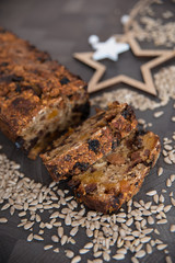 Homemade fruit bread with cosy winter decorations
