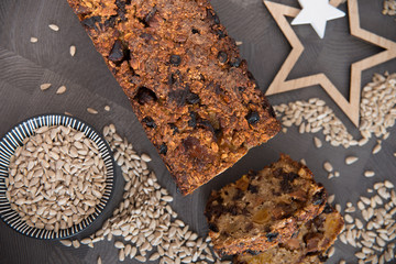 Homemade fruit bread with cosy winter decorations