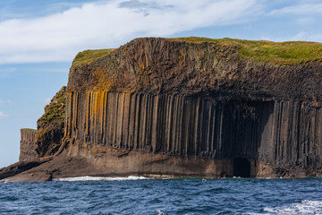 Basalt rock formation and Fingal's Cave  - Island of Staffa - Scotland