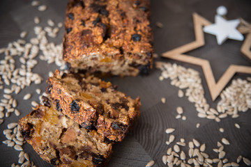 Homemade fruit bread with cosy winter decorations