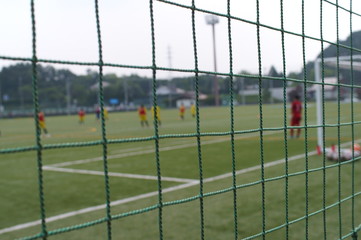 Blurred image, practice scene in a soccer field