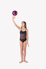 Fototapeta na wymiar young woman with fitness ball