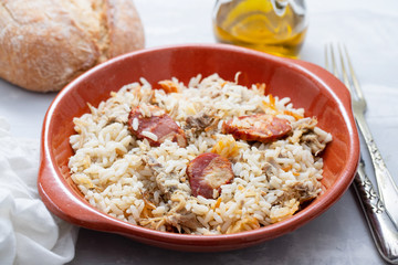 typical portuguese dish rice with duck and smoked sausage